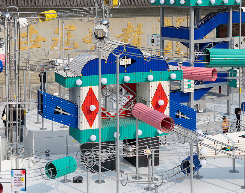 playful rolling ball installation by drawing architecture studio transforms chengdu plaza