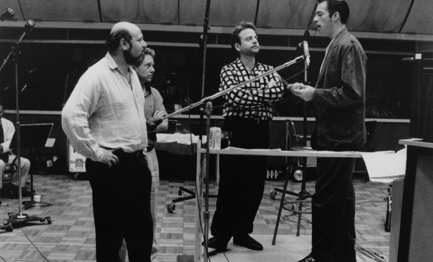 Rob Reiner watches as Harry Connick Jr. sings for the soundtrack to the movie "When Harry Met Sally," circa 1989. (Hulton Archive/Getty Images)