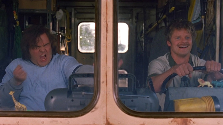 J.D. McNugent and Wayne Lafessier driving in their rodent extermination truck in Saving Silverman