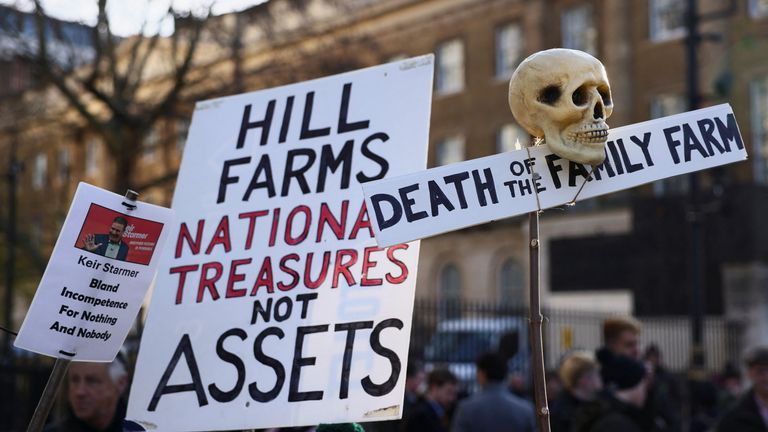 A skull hangs on a sign, as British farmers took part in a protest at Whitehall, calling on the chancellor to change course.