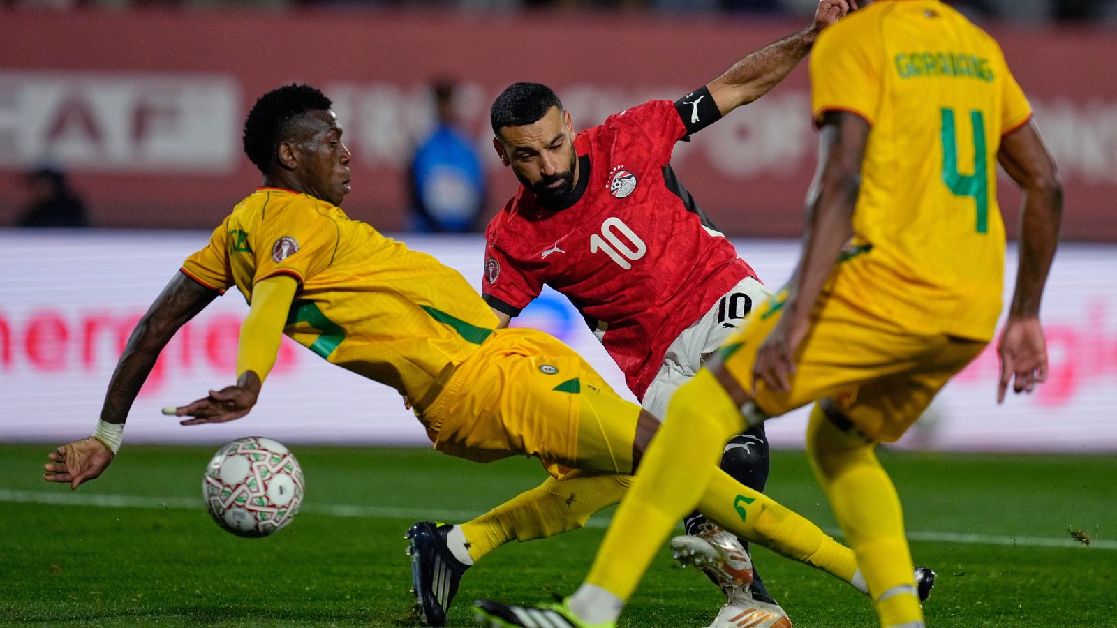 Egypt's Mohamed Salah scores during the Africa Cup of Nations group B soccer match between Egypt and Zimbabwe in Agadir, Morocco, Monday, Dec. 22, 2025. (AP Photo/Mosa'ab Elshamy)