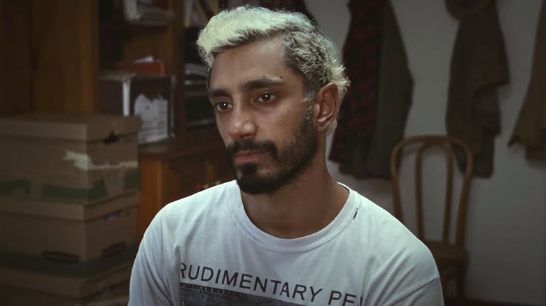 Riz Ahmed as Ruben Stone, sitting dejected in an office in Sound of Metal