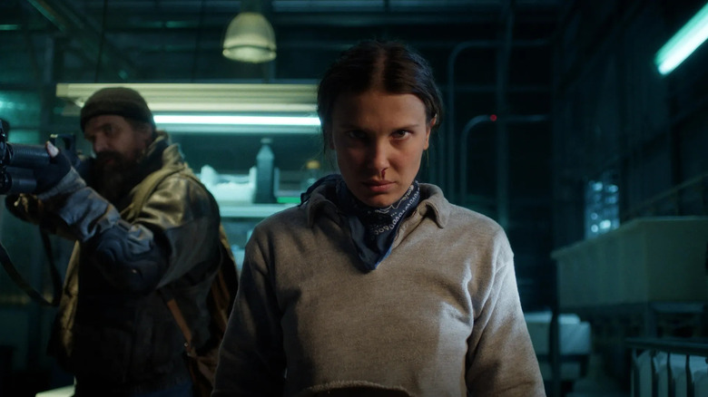 Eleven (Millie Bobby Brown) glares with a bloody nose on Stranger Things