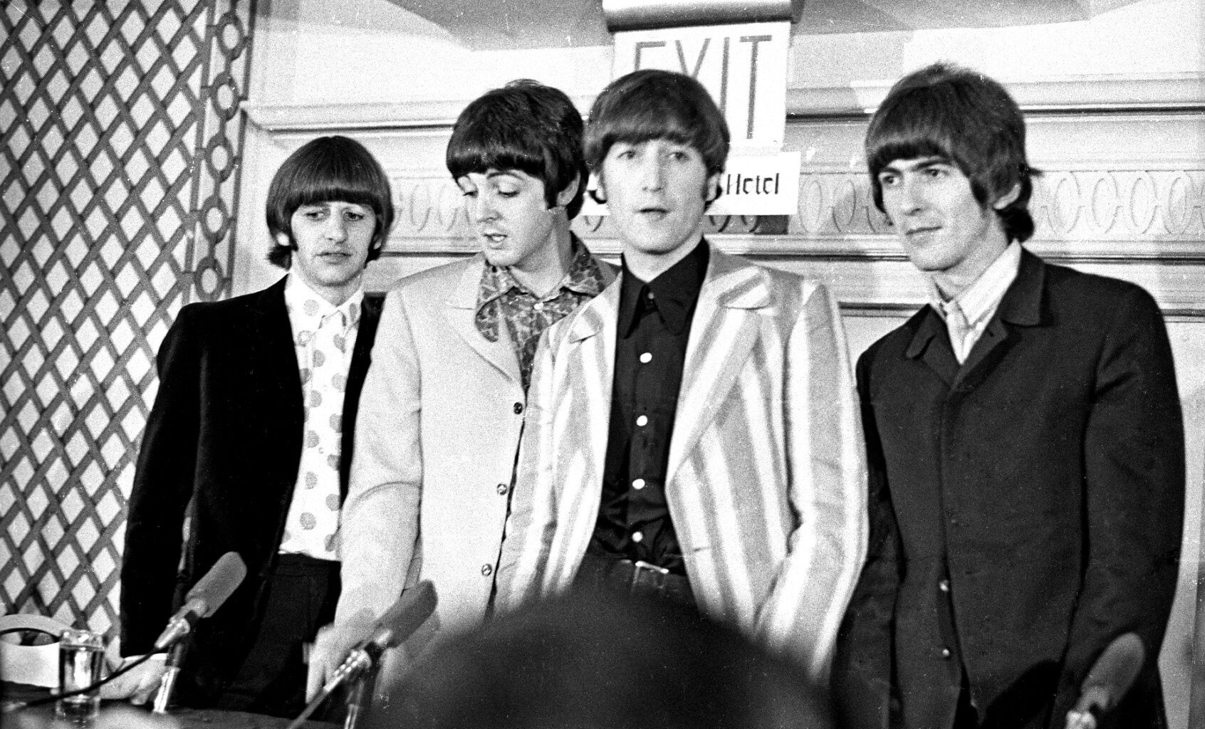 The Beatles answer questions regarding their Shea Stadium concert at a press conference on August 23, 1965 in New York City. (Michael Ochs Archives/Getty Images)