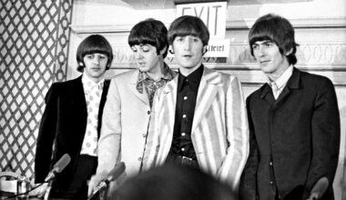 The Beatles answer questions regarding their Shea Stadium concert at a press conference on August 23, 1965 in New York City. (Michael Ochs Archives/Getty Images)