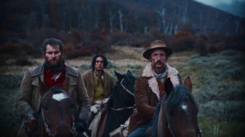 Mark Stanley as Alexander, Camilo Arancibia as Segundo, and Benjamin Westfall as Bill on horseback in The Settlers