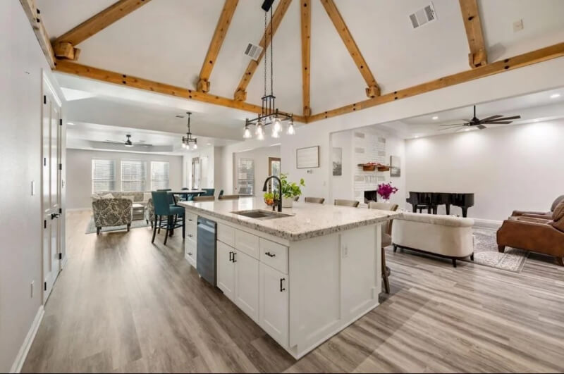 A Redditor shared their McMansion ranch renovation's glowing before-and-after photos, and faced backlash for how unnecessary the changes were.