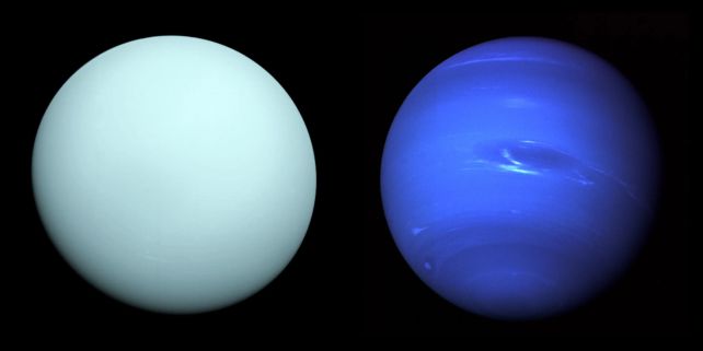 Two blue planets on a black background. The left one is light blue and the right planet is a cobalt blue