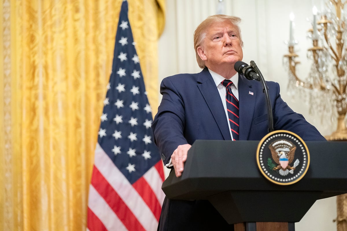 Donald Trump delivering remarks from the East Room of the White House.