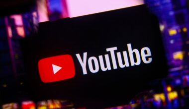 A YouTube logo displayed on a mobile phone screen