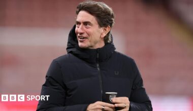 Thomas Frank, manager of Tottenham Hotspur holding a cup with the Arsenal club badge on, ahead of the Premier League match between Bournemouth and Tottenham Hotspur at Vitality Stadium