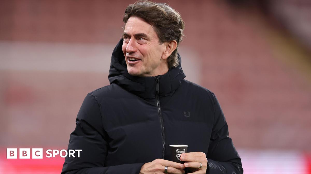 Thomas Frank, manager of Tottenham Hotspur holding a cup with the Arsenal club badge on, ahead of the Premier League match between Bournemouth and Tottenham Hotspur at Vitality Stadium