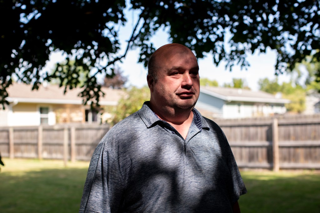 Anthony Ruschke poses for a portrait in his backyard at his home in Coopersville, MI on Wednesday, September 10, 2025. 