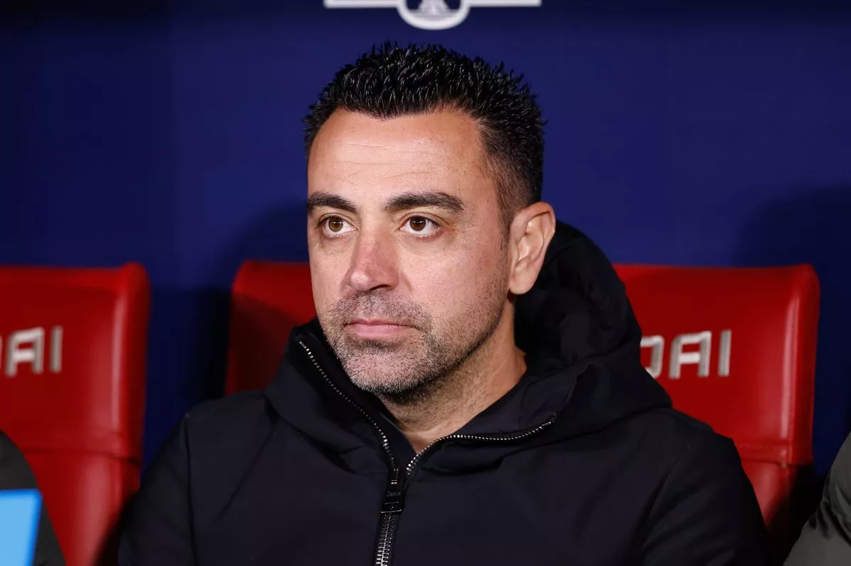 Xavi Hernandez watching Barcelona against Atletico Madrid in 2024