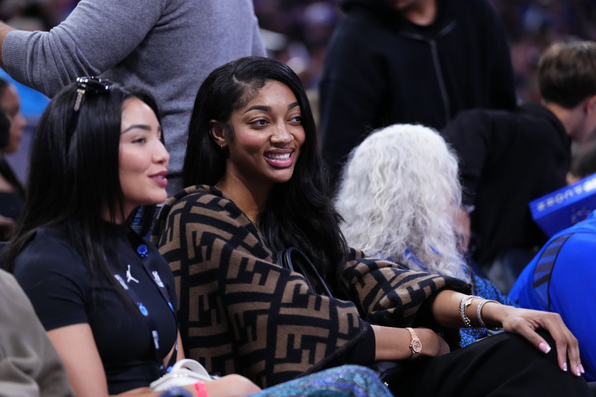 Angel Reese looks on from the sideline during a game between the Orlando Magic and the New Orleans Pelicans at Kia Center on January 11, 2026 in Orlando, Florida