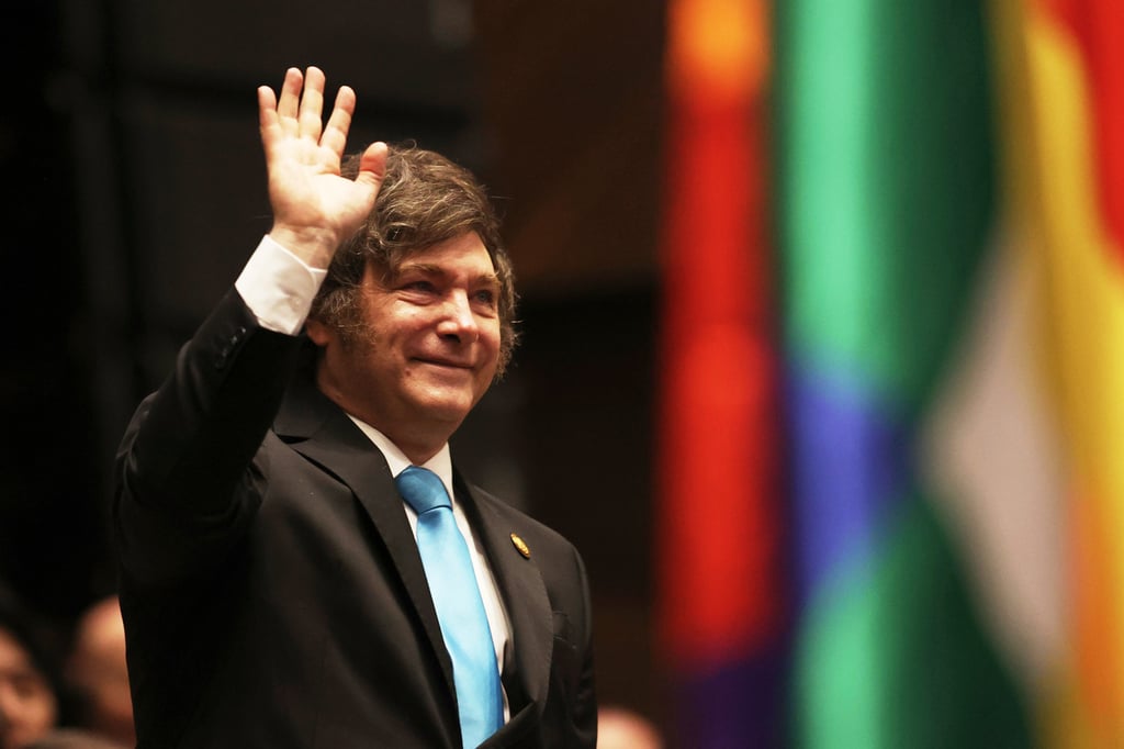 FILE – Argentina’s President Javier Milei waves as he attends an event in La Paz, Bolivia, in November. Photo: AP
