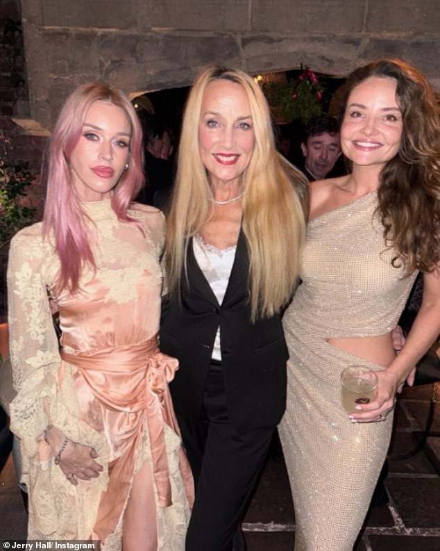 Mick celebrated the festive season with both his ex-wife Jerry Hall and fiancée Melanie Hamrick by his side; pictured Jerry with her goddaughter, Lady Mary Charteris, and her daughter-in-law, Anouk Jagger