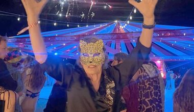 Mick Jagger, 82, puts on an animated display in animal mask as he rings in the New Year at outdoor party