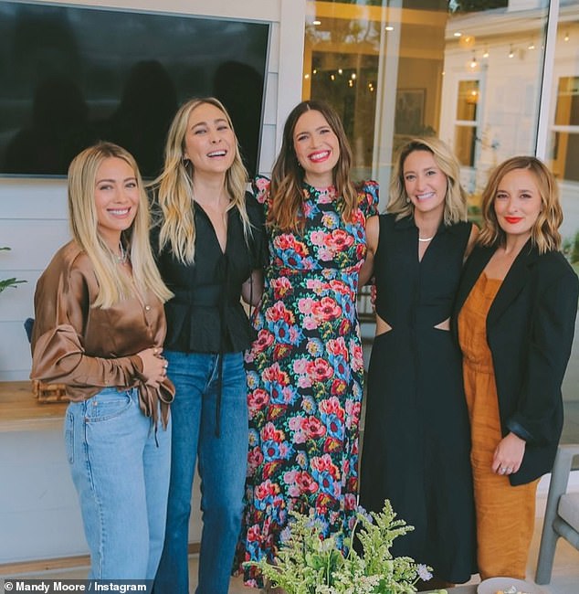 Mom of four Hilary and mom of three Mandy have been close friends for years since having babies around the same time (pictured left and centre with other friends at Mandy's 2022 baby shower)