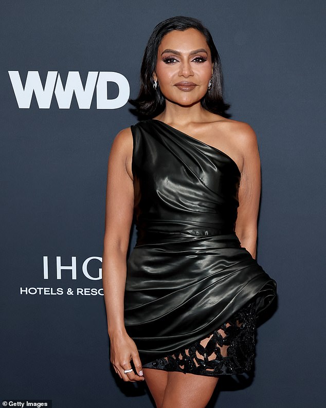 The Office alum's cropped brunette hair was flipped up at the ends to frame her flawlessly made-up face