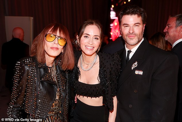 Annie Schulhof, Emily Blunt and Lord Gavin McLeod-Valentine gathered for a photo