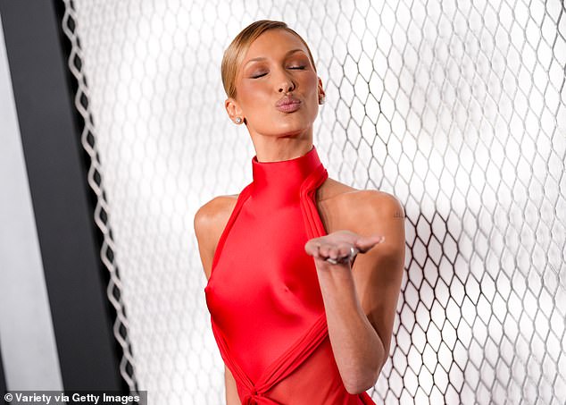 Hadid blew kisses at cameras