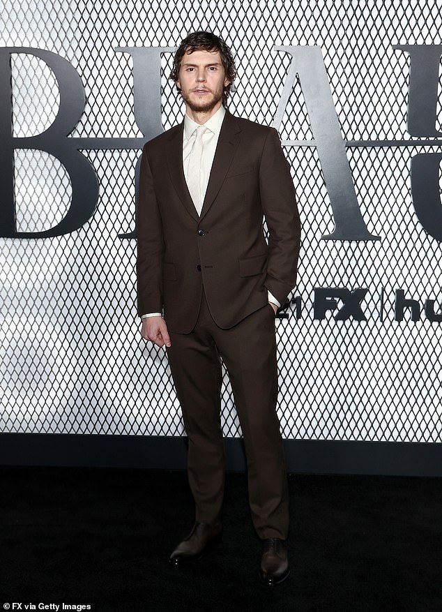 The actor, 38, completed his outfit with a white dress shirt and tie