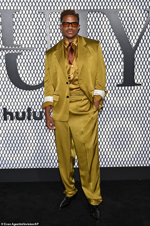 The Beauty star Jeremy Pope, 33, smoldered for shutterbugs in an incredible chartreuse-toned suit complete with a matching vest and brown tie