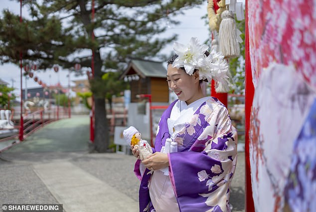 A bride smiles on her 'wedding' day. Photo courtesy of Share Wedding
