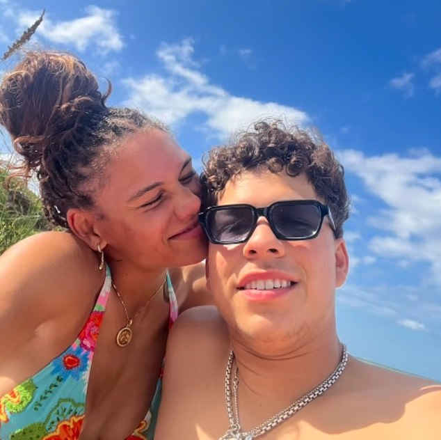 The 23-year-old (pictured with his girlfriend, soccer star Trinity Rodman) also divided fans with a political post during the last US presidential election