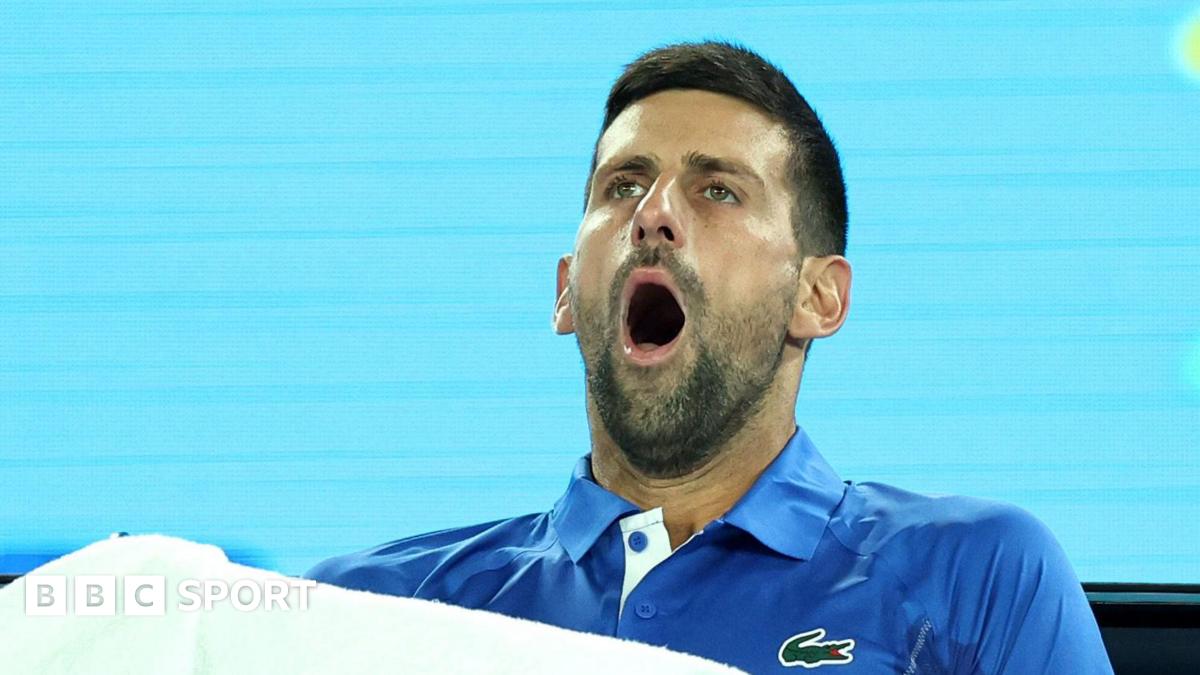 Novak Djokovic yawns during a 2024 Australian Open match