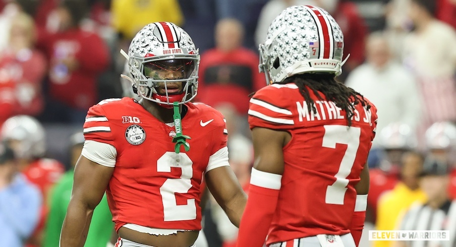 Caleb Downs and Jermaine Mathews Jr.