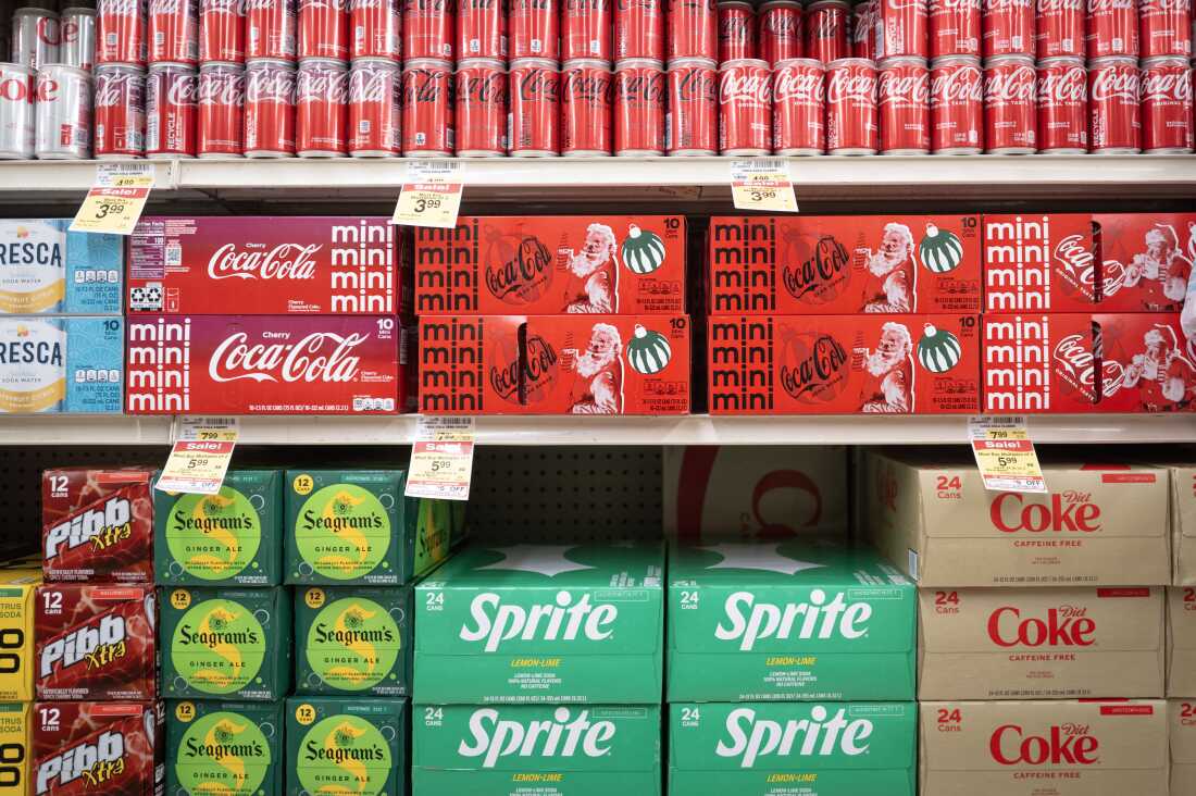 Coca-Cola soft drinks are offered for sale at a grocery store on December 11, 2024 in Chicago. Changes to SNAP programs in 2026 in some states will prevent individuals from using benefits to buy soda or other sugary drinks or foods.