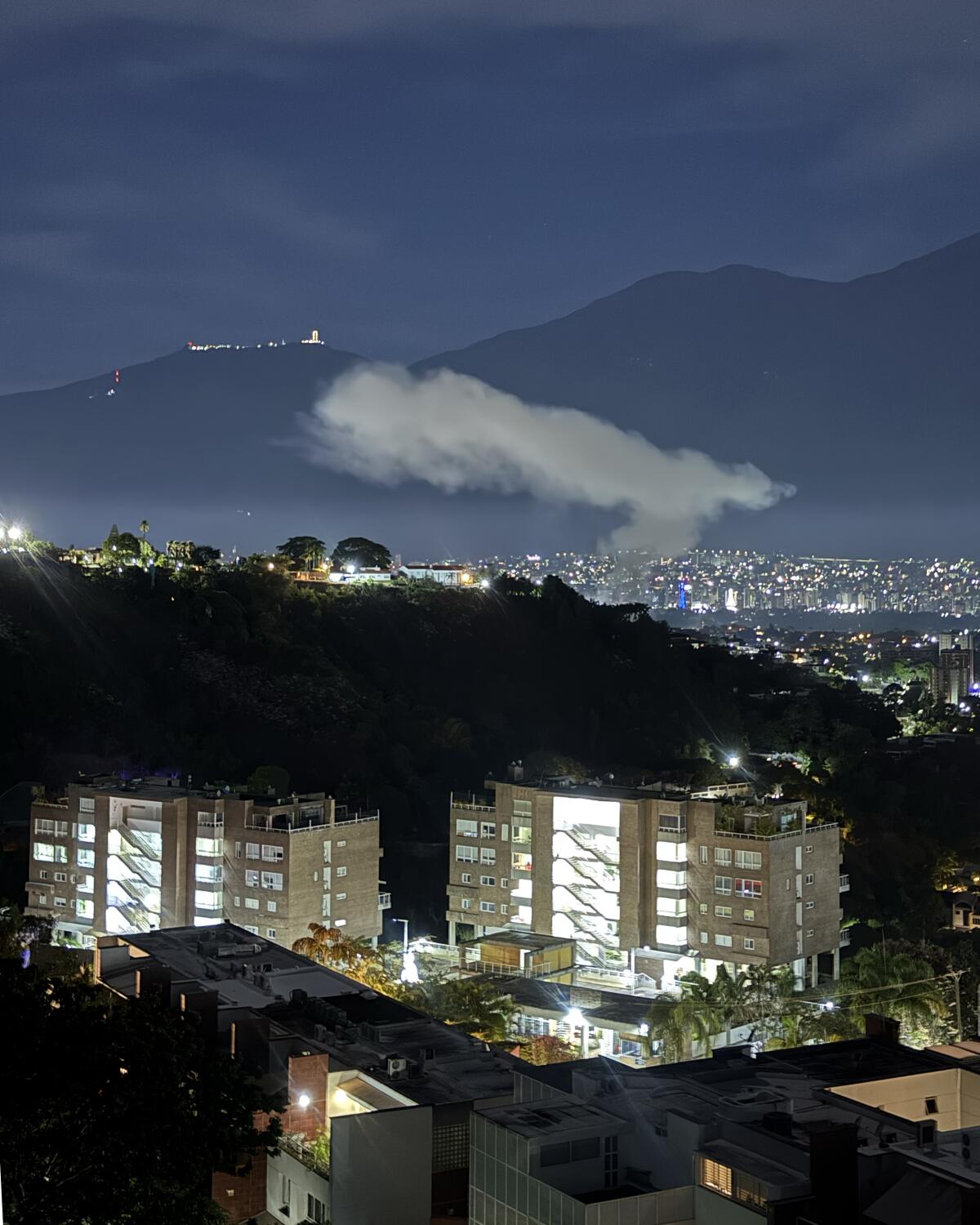 Smoke rises over Caracas