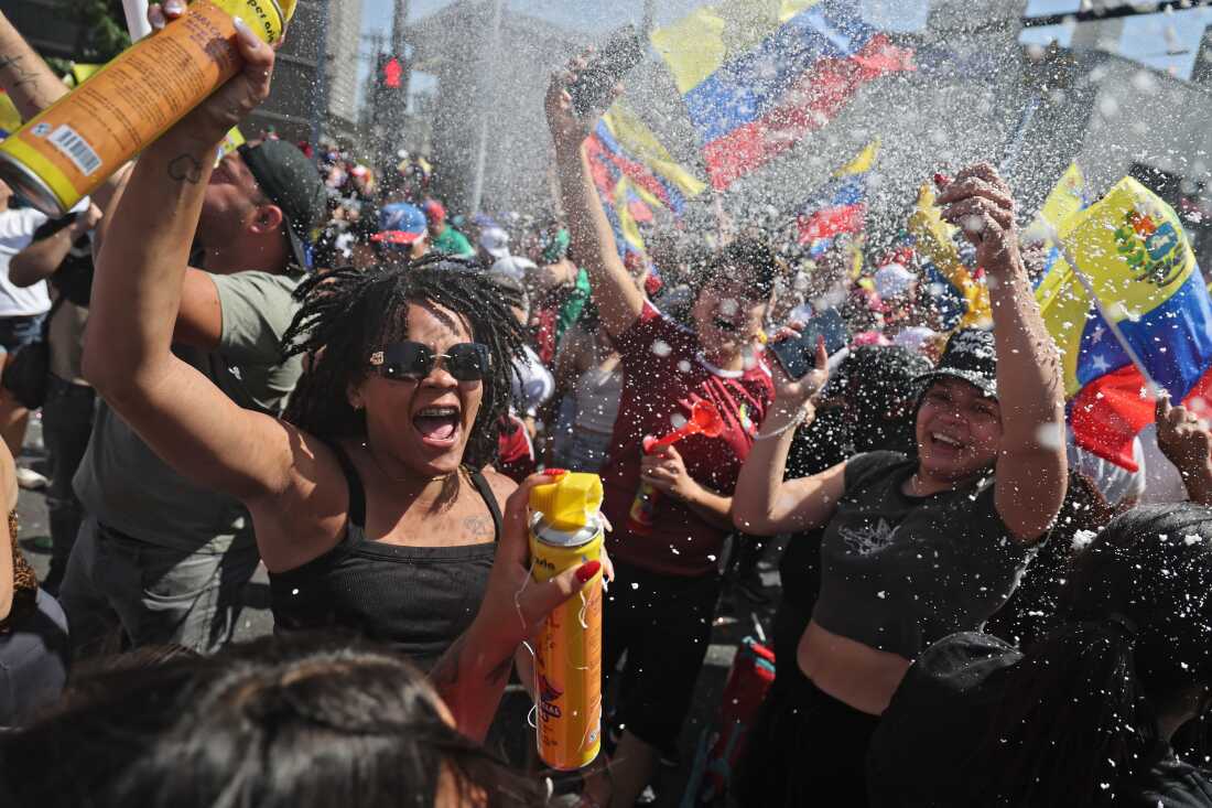 Venezuelans living in Chile celebrate Maduro's capture in Santiago on Saturday.