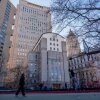 People play basketball in front of Daniel Patrick Moynihan United States Courthouse in New York City on Sunday. Maduro is set to make his first court appearance on Monday.