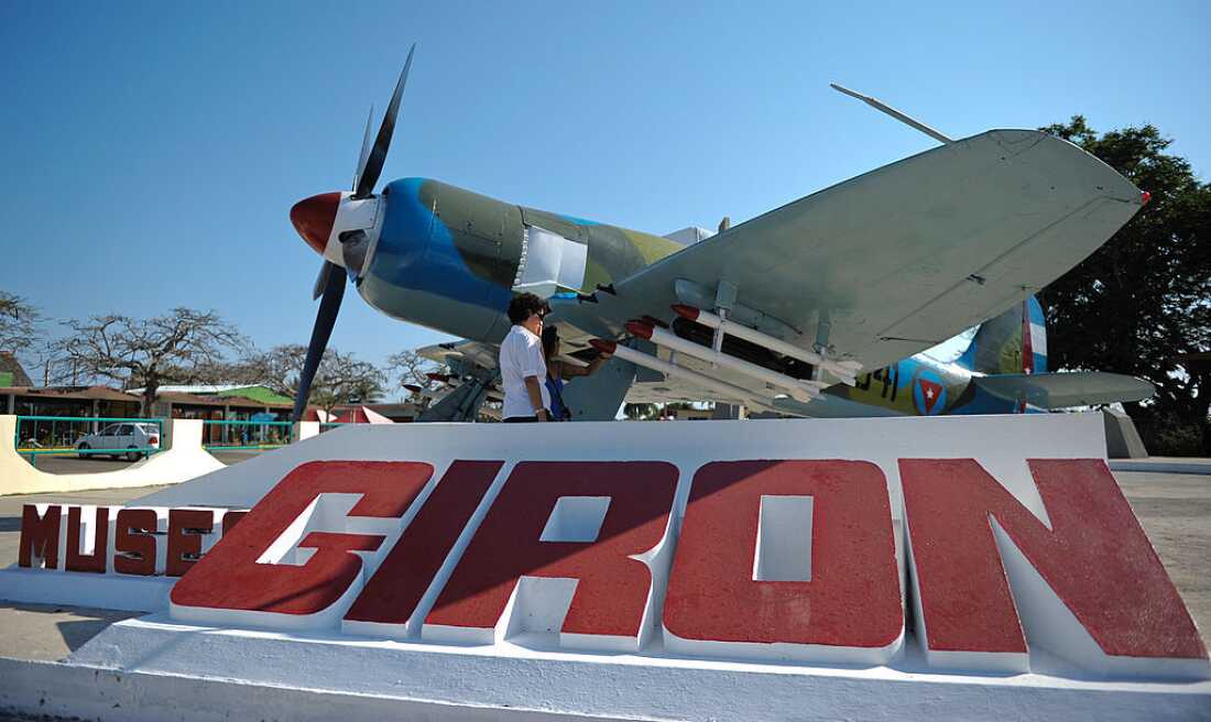 A tourist watches at Playa Giron Museum a British-made Hawker Sea Fury airplane that saw action in the Bay of Pigs combats 50 years ago, at Bay of Pigs, Matanzas province,