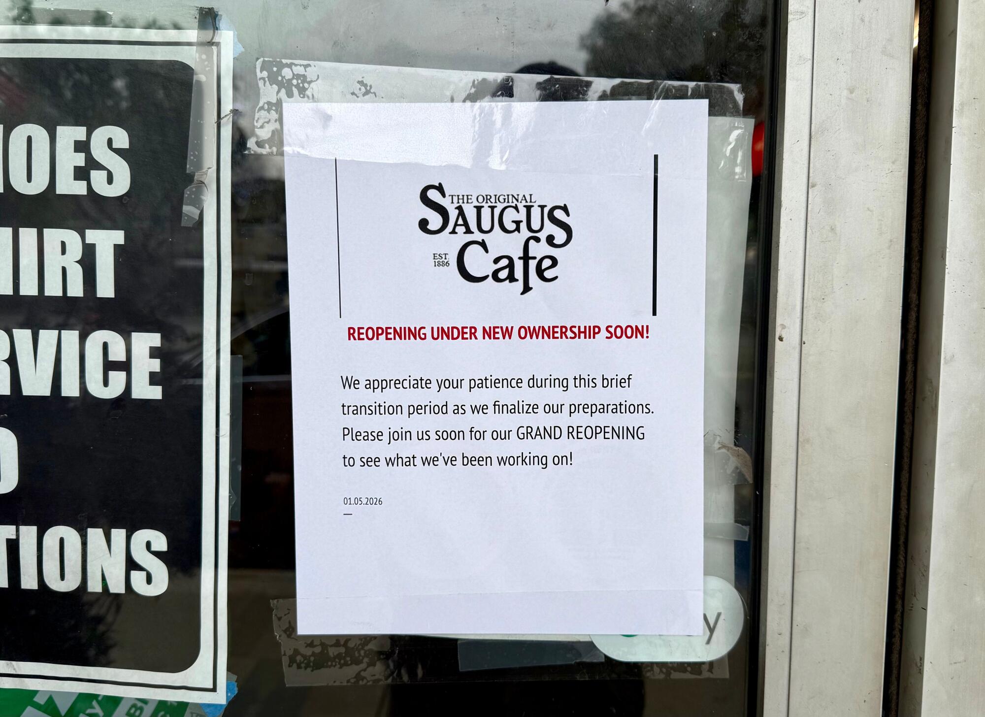 A sign posted to the Saugus Superette
