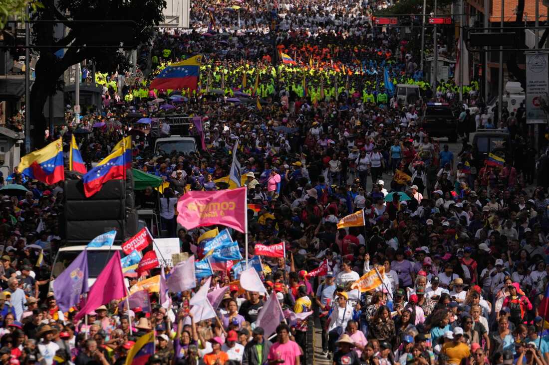 Government supporters gather for a women's march to demand the return of Venezuelan President Nicolas Maduro in Caracas, Venezuela, Tuesday, Jan. 6, 2026, three days after U.S. forces captured him and his wife.