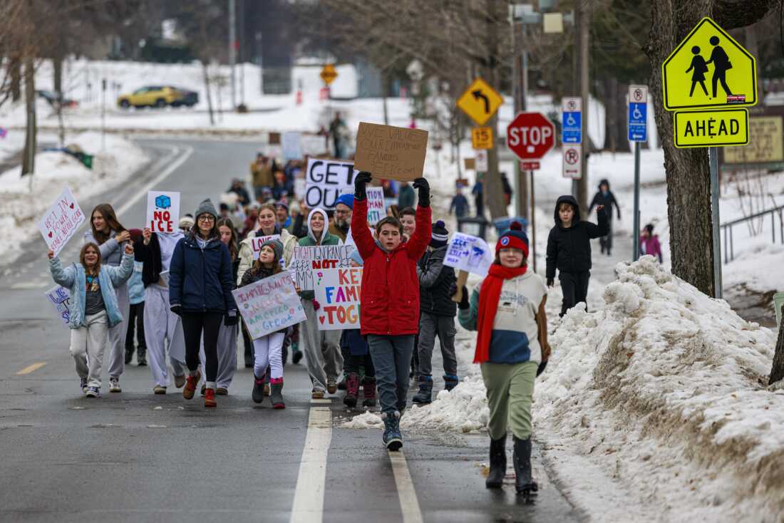 Young students march near Kenny Community School in Minneapolis a day after an ICE agent shot and killed a 37-year-old woman on Thursday, Jan. 8, 2026.