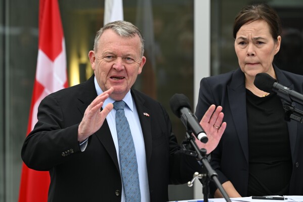 Denmark's Foreign Minister Lars Løkke Rasmussen and Greenland's Foreign Minister Vivian Motzfeldt speak at a news conference at the Embassy of Denmark, Wednesday, Jan. 14, 2026, in Washington. (AP Photo/John McDonnell)