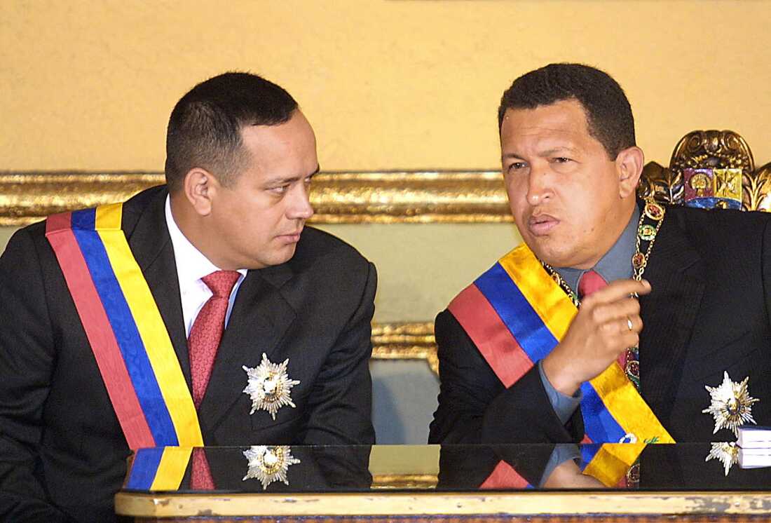 This 17 Jan. 2002 file photo shows then Venezuelan president Hugo Chavez (R) with his new vice-president Diosdado Cabello (L) during a ceremony at the Government Palace in Caracas.