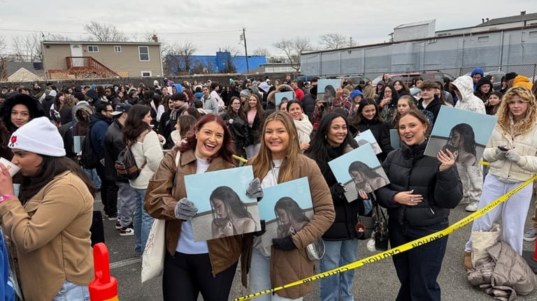Several hundred people waited in frigid temperatures to meet Beer,...