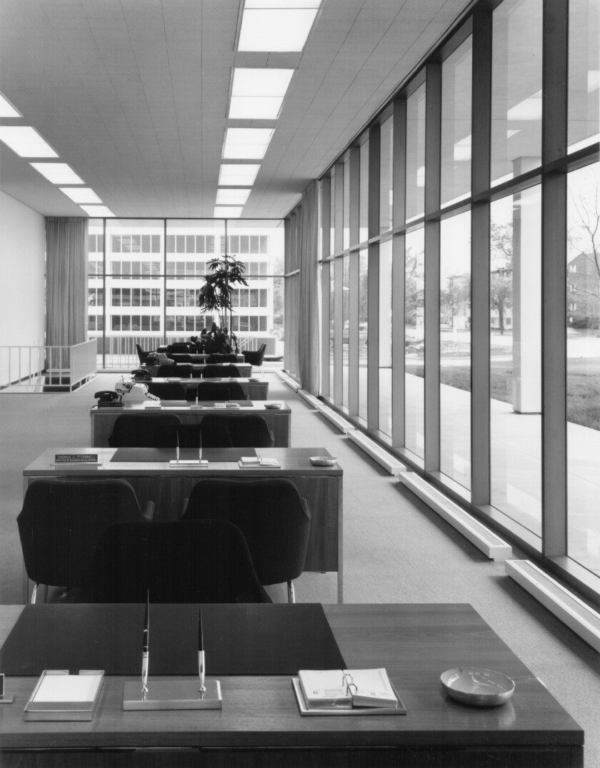 Black-and-white interior image of Skokie Federal showing a row of desks and chairs, shortly after it was completed in 1968.
