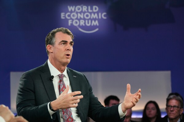 Oklahoma Gov. Kevin Stitt speaks during the Annual Meeting of the World Economic Forum in Davos, Switzerland, Wednesday, Jan. 21, 2026. (AP Photo/Markus Schreiber)