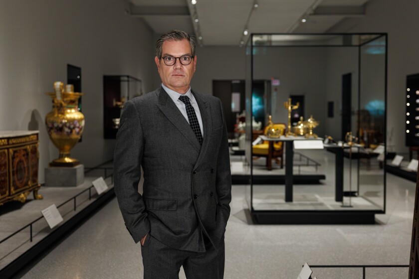 James Rondeau, president of the Art Institute of Chicago, stands in one of the exhibit rooms at the Art Institute of Chicago.
