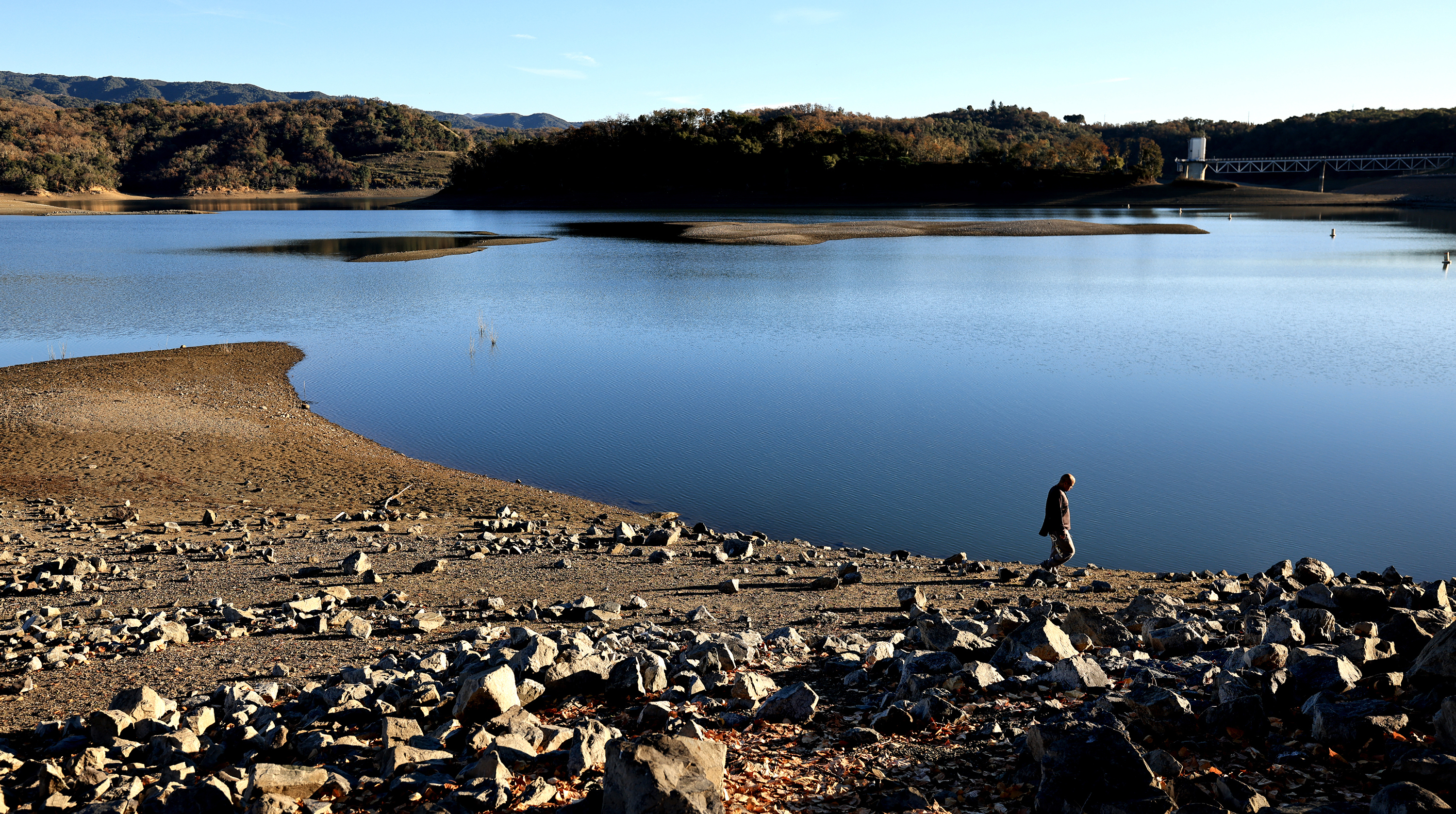 Javier Soberanis of Ukiah, takes a stroll on the exposed...
