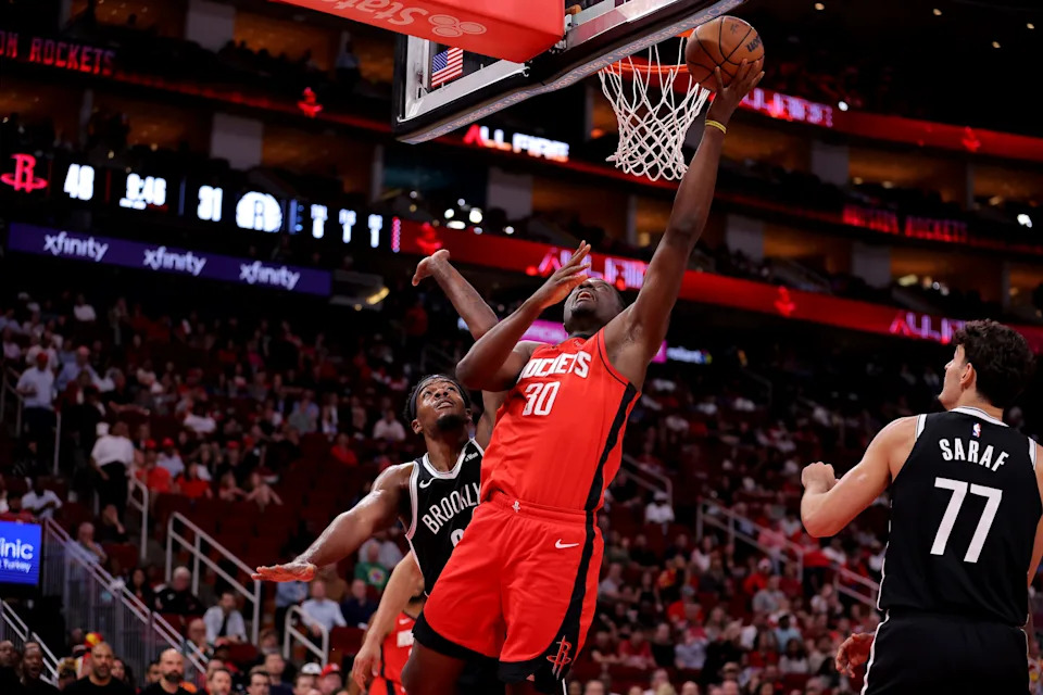 Oct 27, 2025; Houston, Texas, USA; Houston Rockets center Clint Capela (30) shoots inside against the Brooklyn Nets during the second quarter at Toyota Center. Mandatory Credit: Erik Williams-Imagn Images