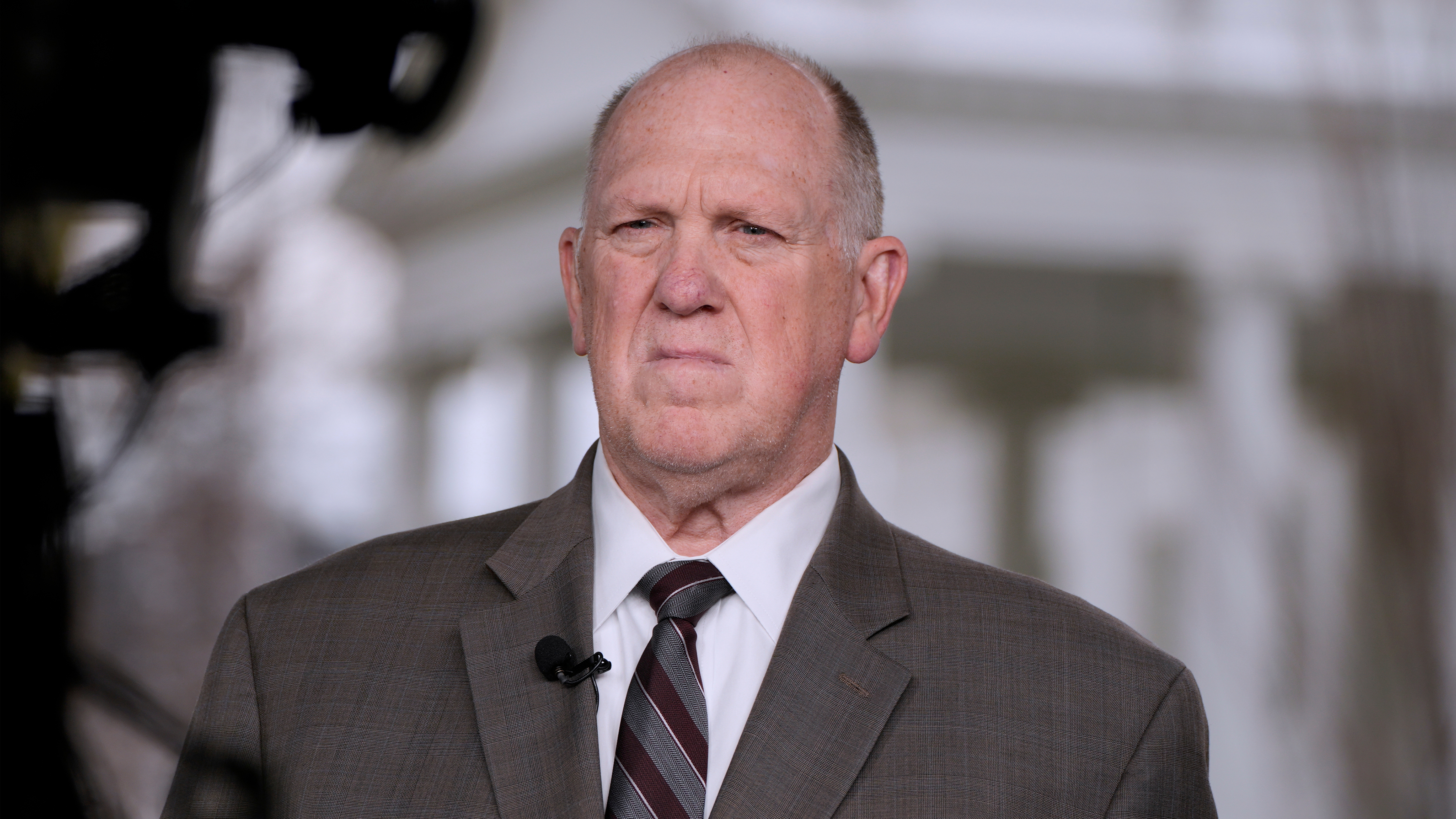 White House border czar Tom Homan listens to reporters during an interview, Wednesday, Jan. 14, 2026, in Washington.