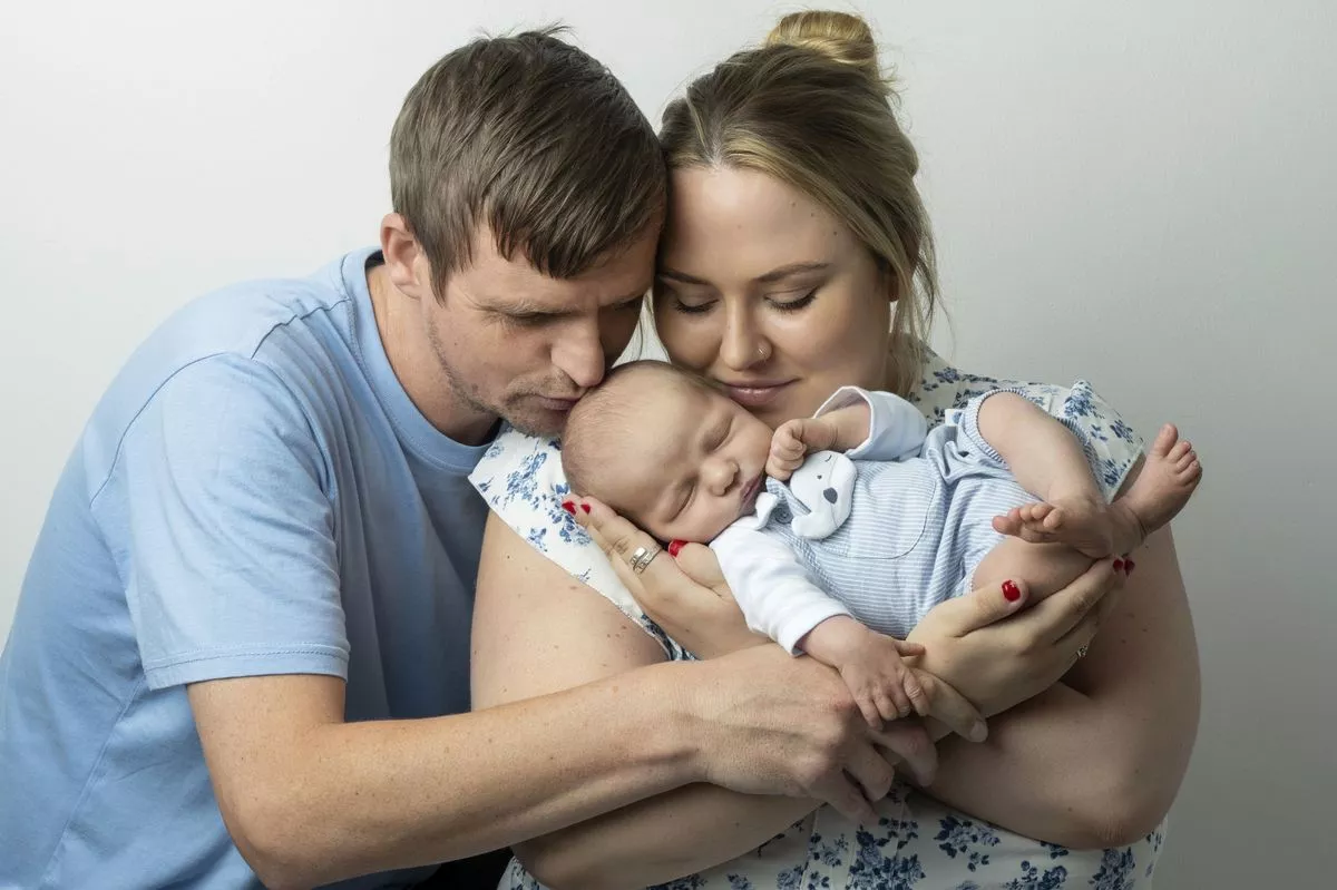 Molly with fiancé Michael and son Hudson (Kennedy News/Martin Steel Photography)